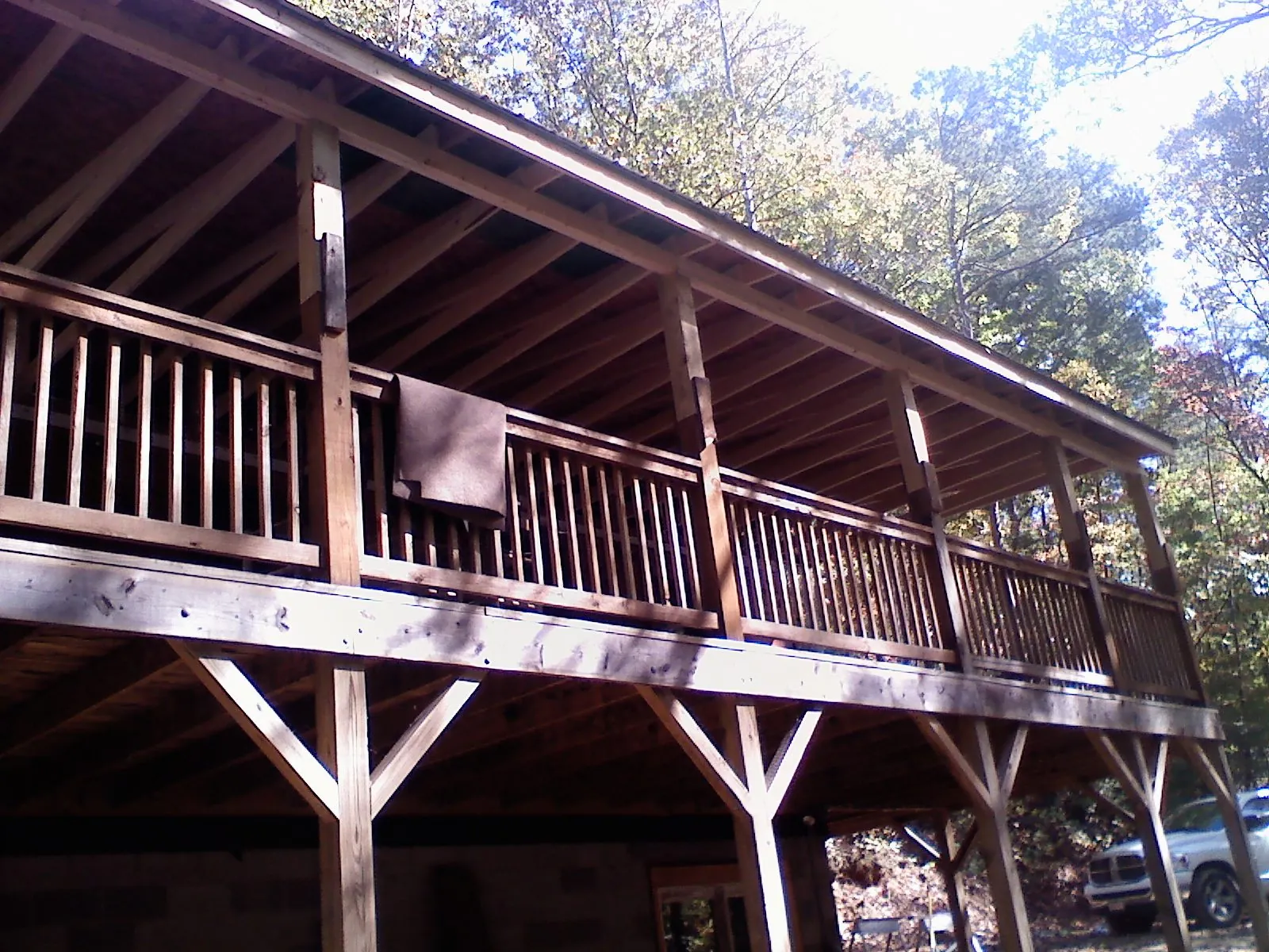 Timber framing under a new elevated porch and deck — Roof Leak Repair in Salado by Roofing Brothers